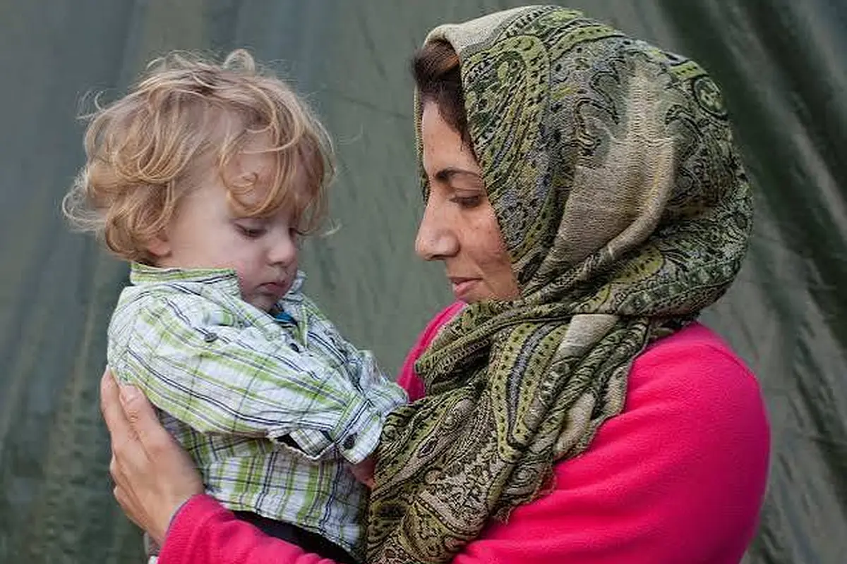 Adult holding a young child